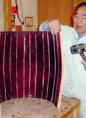 Dr. Roy Ebihara of Icho Daiko reconnecting barrel staves, Cleveland, Ohio, ca. 2003.